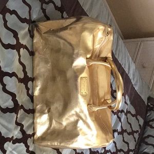 Michael Kors Gold Duffle Bag